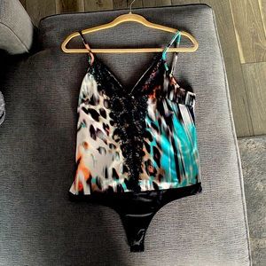 Bebe multi color leopard body suit size Large